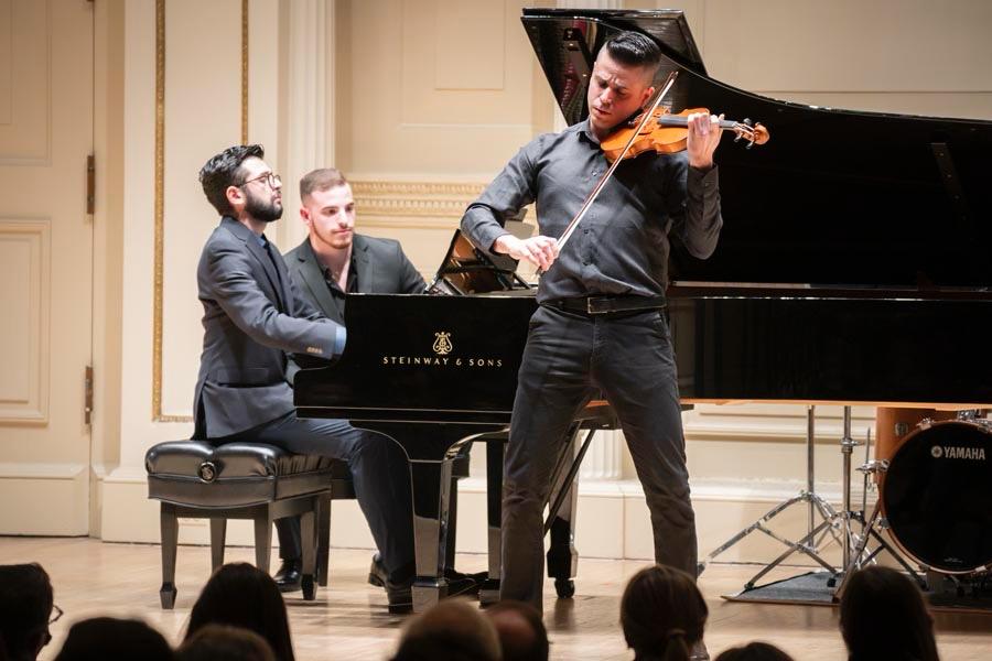 Oldet Ibo performing at piano